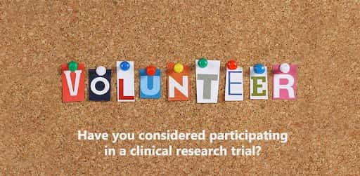 The word Volunteer made from individual letters clipped from a magazine and pinned to a cork board and he sentence "Have you considered participated in a clinical research trail?" overlaid below